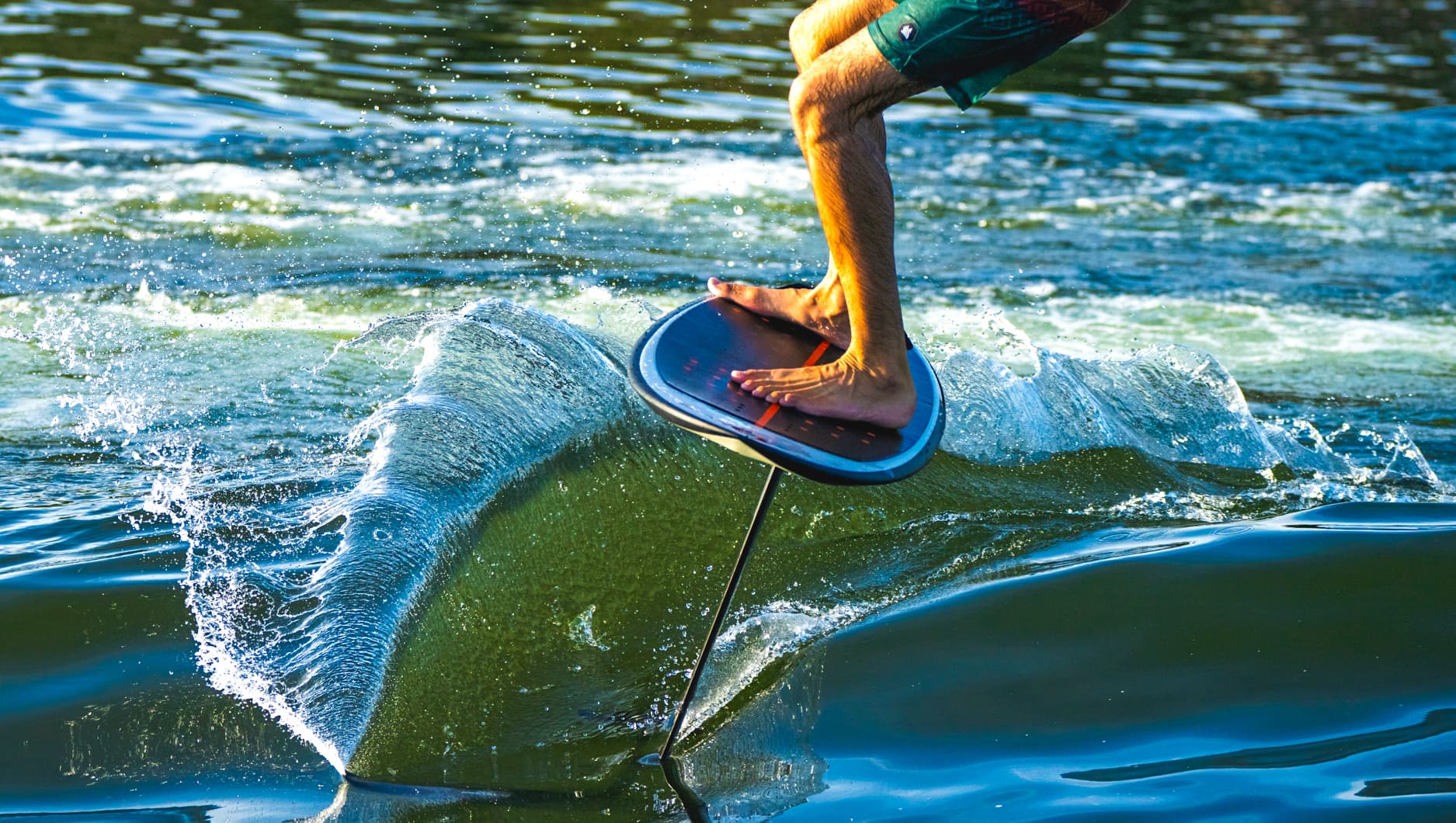 Wake Foiling Behind a Small Boat