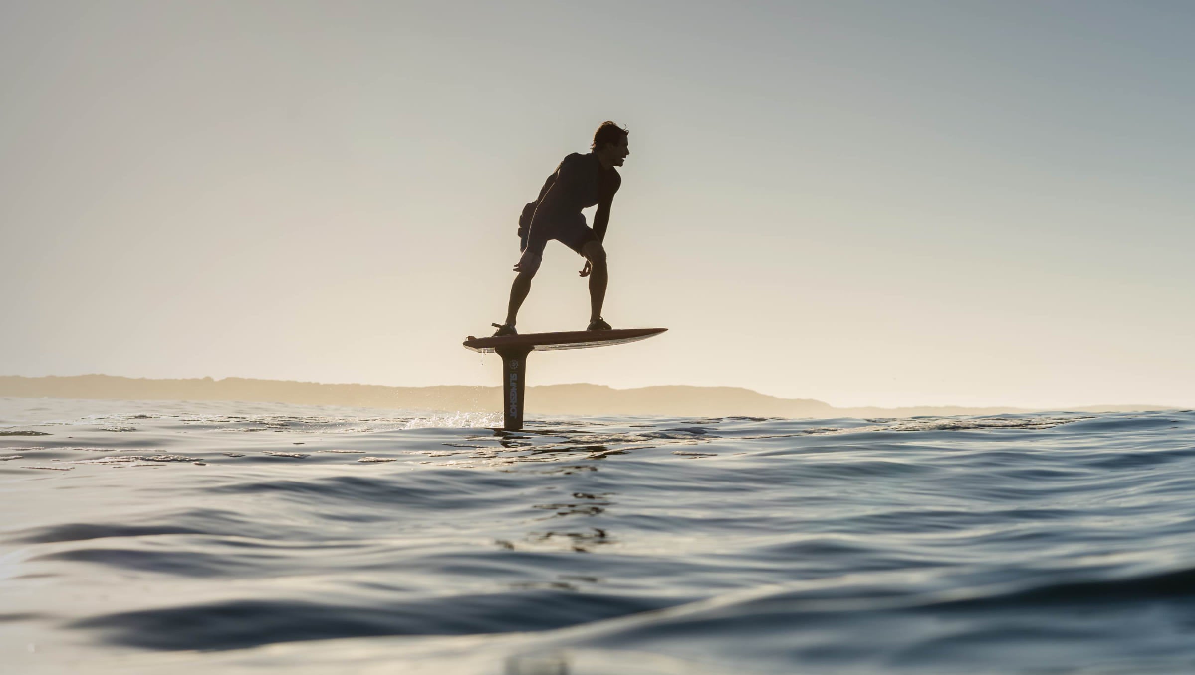 Cruising on the Slingshot Phantasm Carbon foil through light ocean swell. 